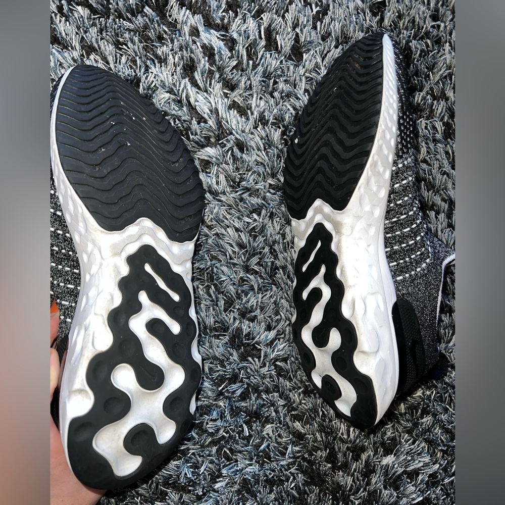 Nike React Phantom Run Flyknit tennis shoes.